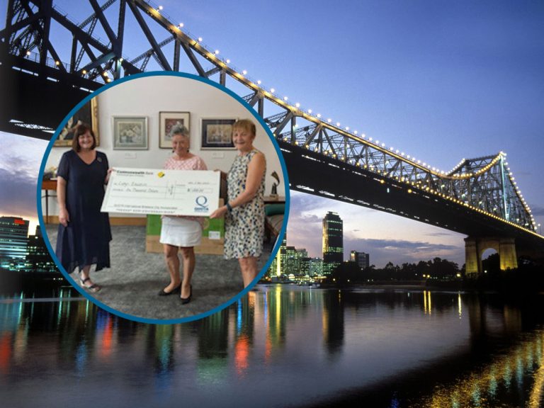 Quota Brisbane members presenting the large cheque to Zephyr Education